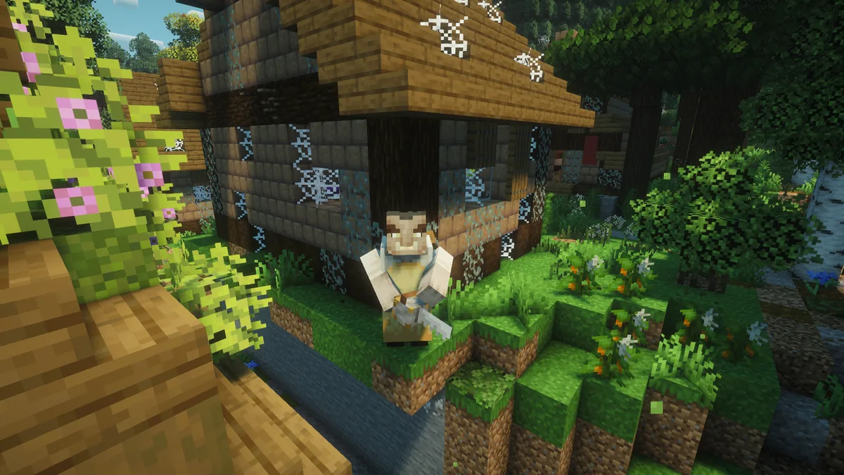 A villager outside a wooden house in a heavily modded world, with custom flowers and trees around it.