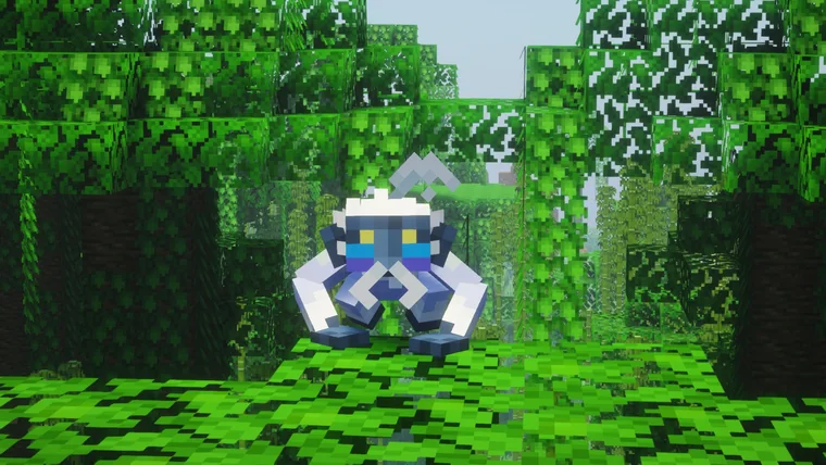 A small white and blue creature with wide eyes sitting among bright jungle leaves.