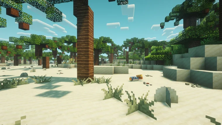 A desert oasis with tall palm-like trees on sandstone terrain, and a small colorful bird among the rocks.