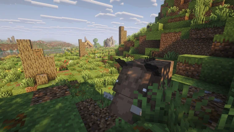A dark, bony horse-like creature standing near a wooden house, with a village visible in the distance.