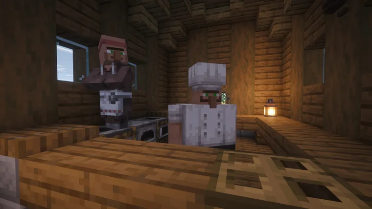 Two villagers indoors, one dressed as a chef in white, beside a stove lit by lantern light.